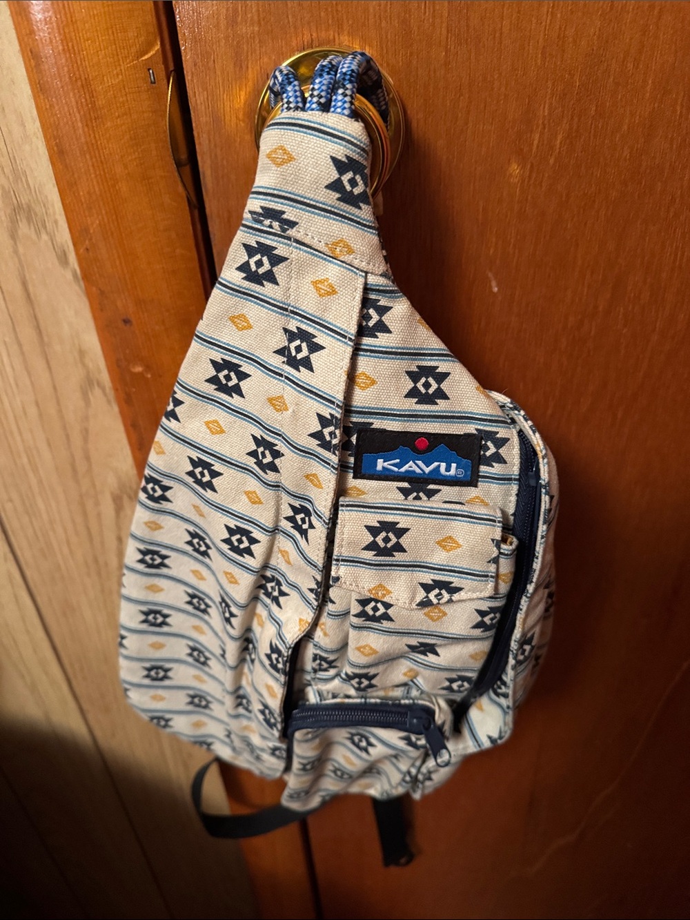 Kavu Beige Aztec-Pattern Sling Bag with Navy Accents